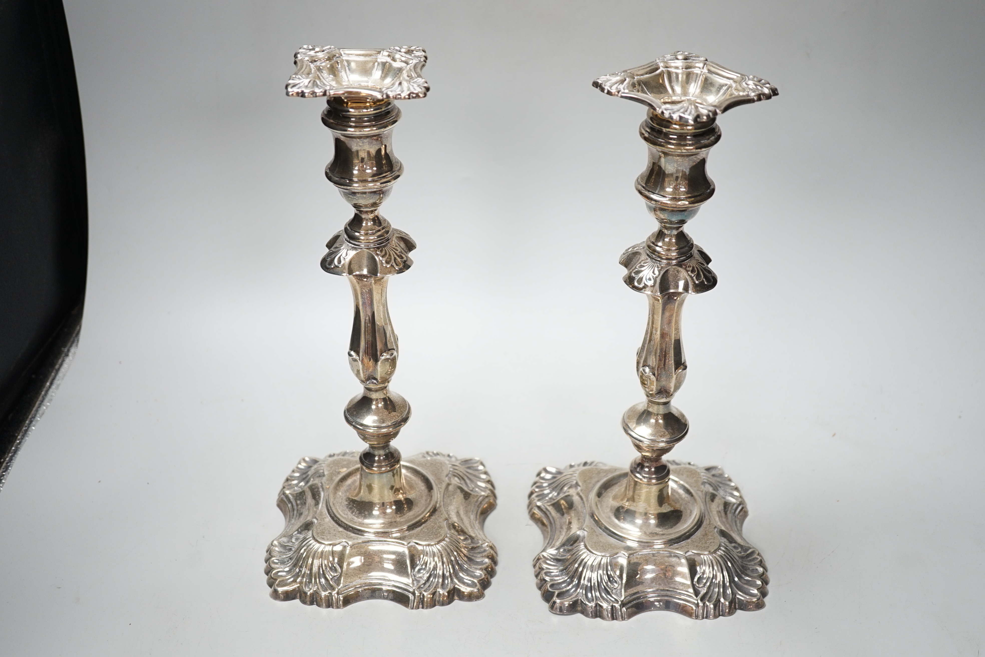 A pair of Edwardian silver candlesticks, with waisted, knopped stems, William Hutton & Sons Ltd, London, 1907, 30cm, weighted.